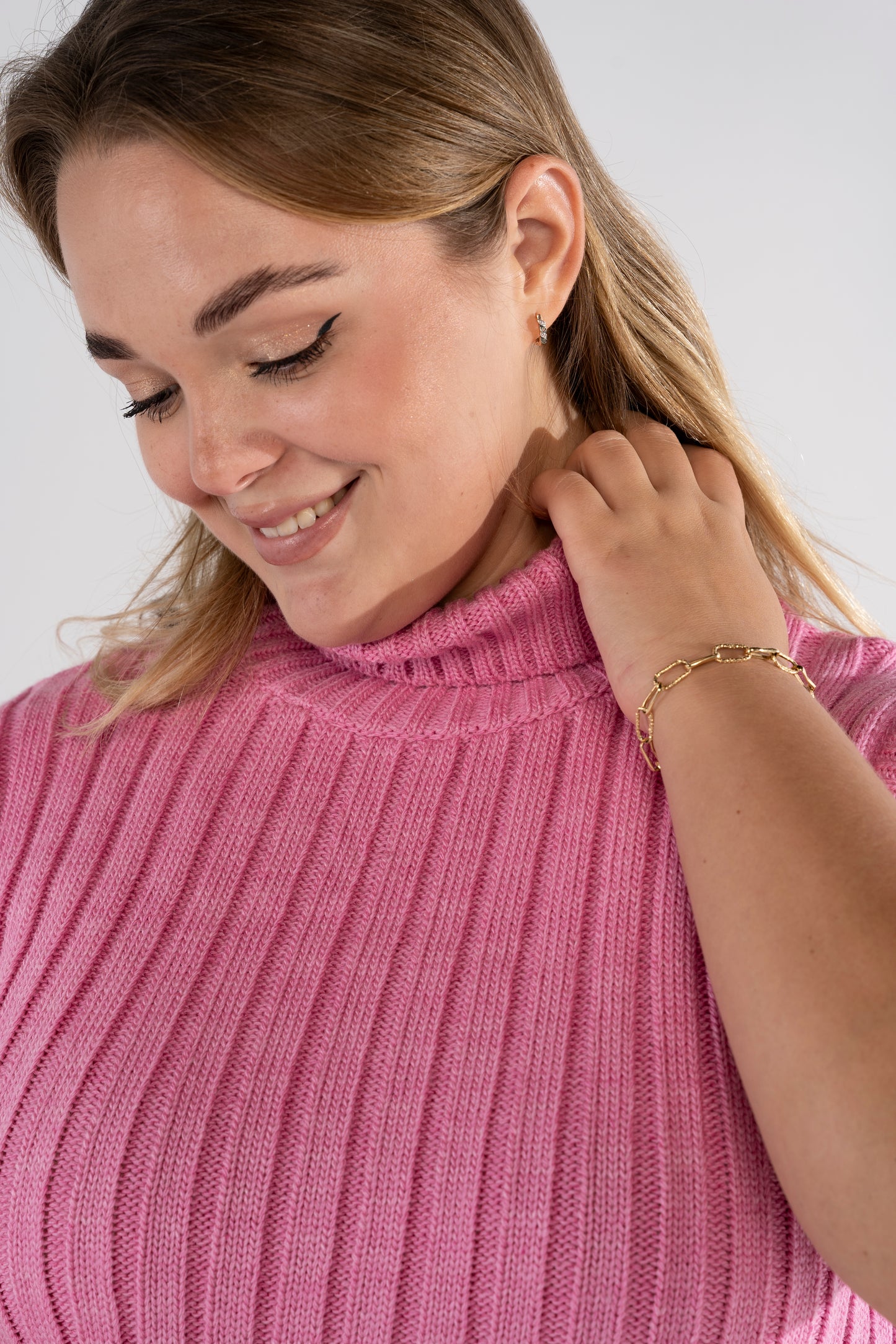 The Turtleneck Sleeveless Sweater